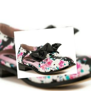 Iron fist buns and roses flats